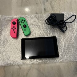 Nintendo Switch New Model ( Pink And Green) With Charger 