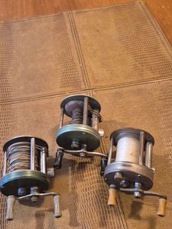 Three vintage spinning reels