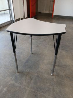 ** ADJUSTABLE TABLES