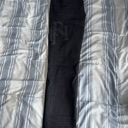 Amiri jeans stacked letters size 34