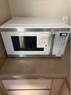 Hamilton Beach 1.1 Cu ft  1000w Countertop Microwave Oven, White and Stainless Steel