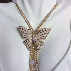 Beautiful butterfly chandelier gold tone and cream necklace.