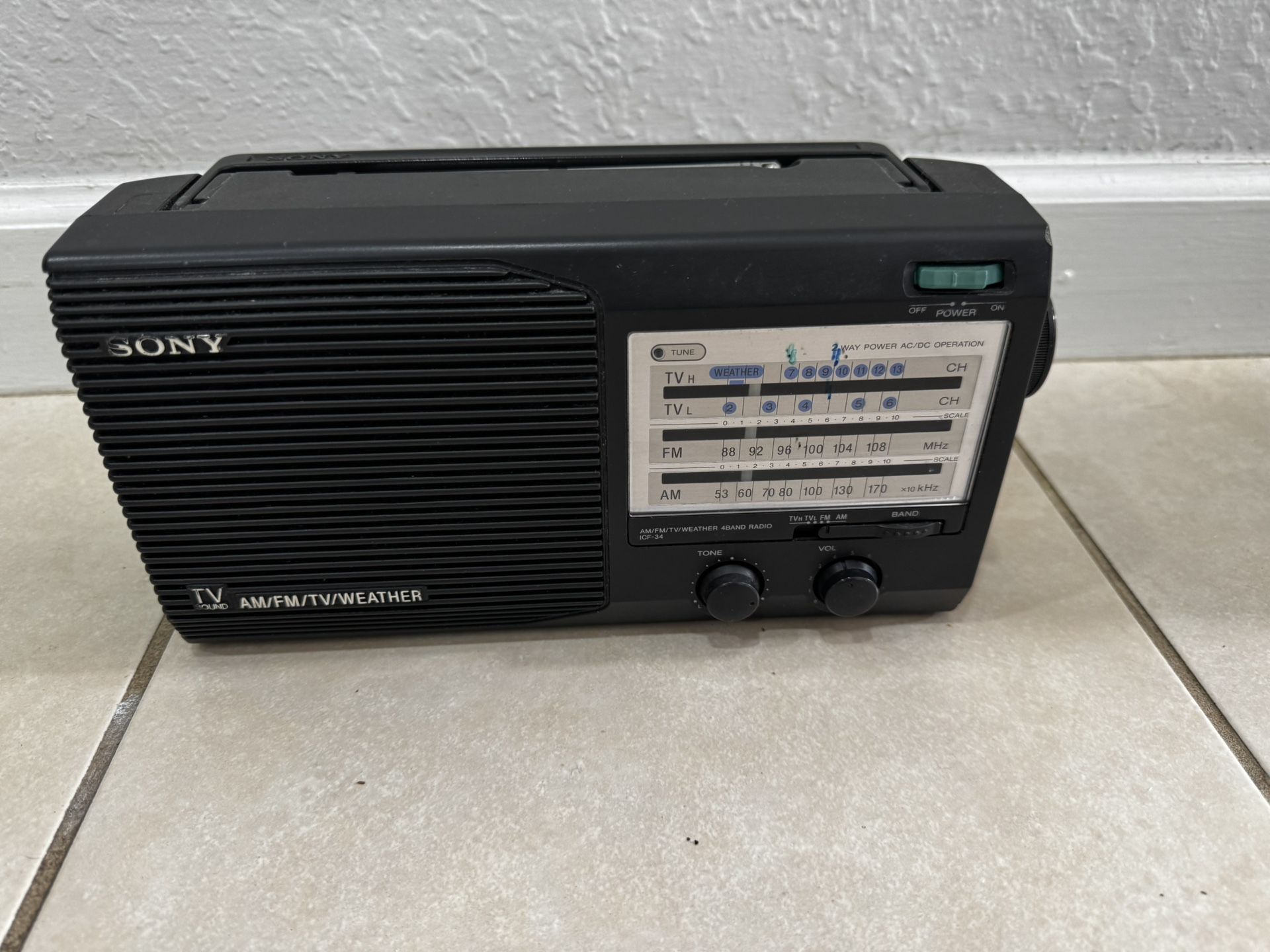 Am / FM /TV/Weather 4 BAND Radio ICF-34 . Working . Good Condition