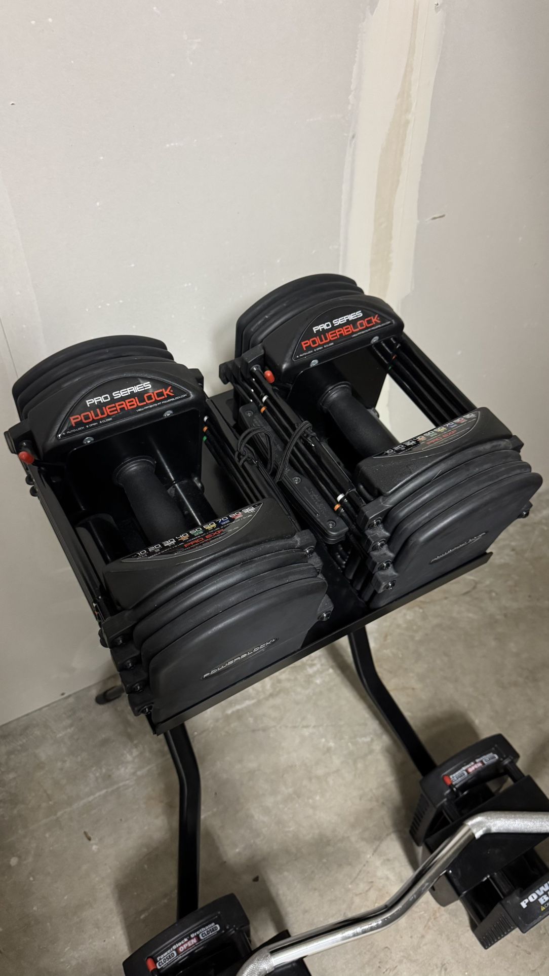 Powerblock Pro series 50ibs Expandable Up To 90ibs Includes Stand And Barbell Attachments