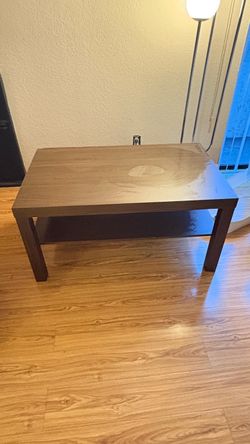 PICK UP BY 8/29- Brown coffee table