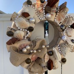 Fantastic wreath with beautiful seashells , marble