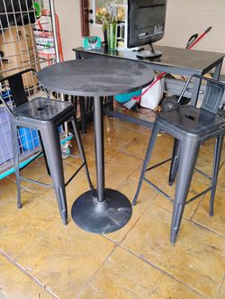High top Table And 2 Stools. 