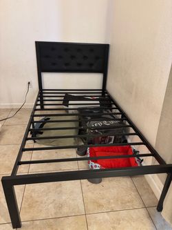 Twin bed frame (mattress included upon request for free)