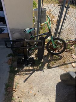 Kids bike small skateboard and tv stand