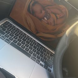 Macbook (2020) M1 with an apple mouse 