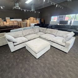 Gray modular sectional w/ ottoman