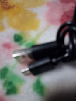 Black USB Charging Cable and ear buds