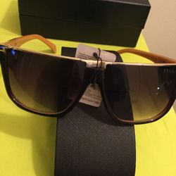 Beige and black sunglasses