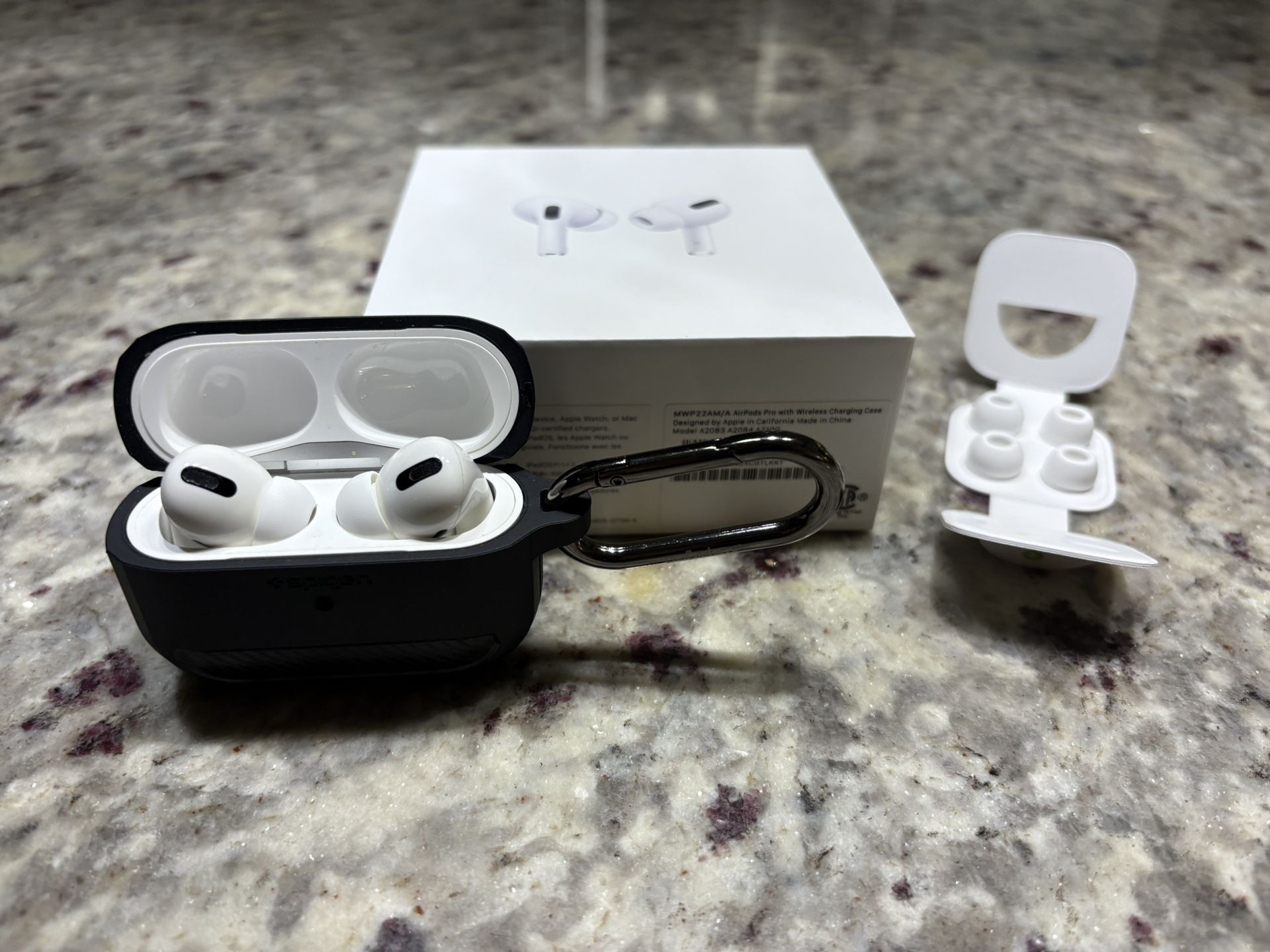 Genuine Apple AirPods Pro 1st Gen with wireless charging case and Spigen protective case, Like New. 
