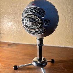 a Blue Snowball USB Microphone, specifically the iCE model in white