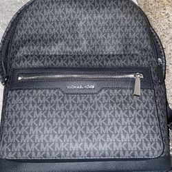 Chic Michael Kors backpack with signature monogram design. Brand New Never Used 