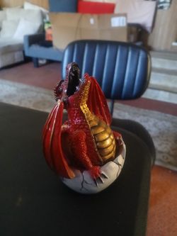Reg Dragon coming out of egg