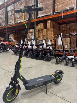 Front and rear shock-absorbing electric scooters