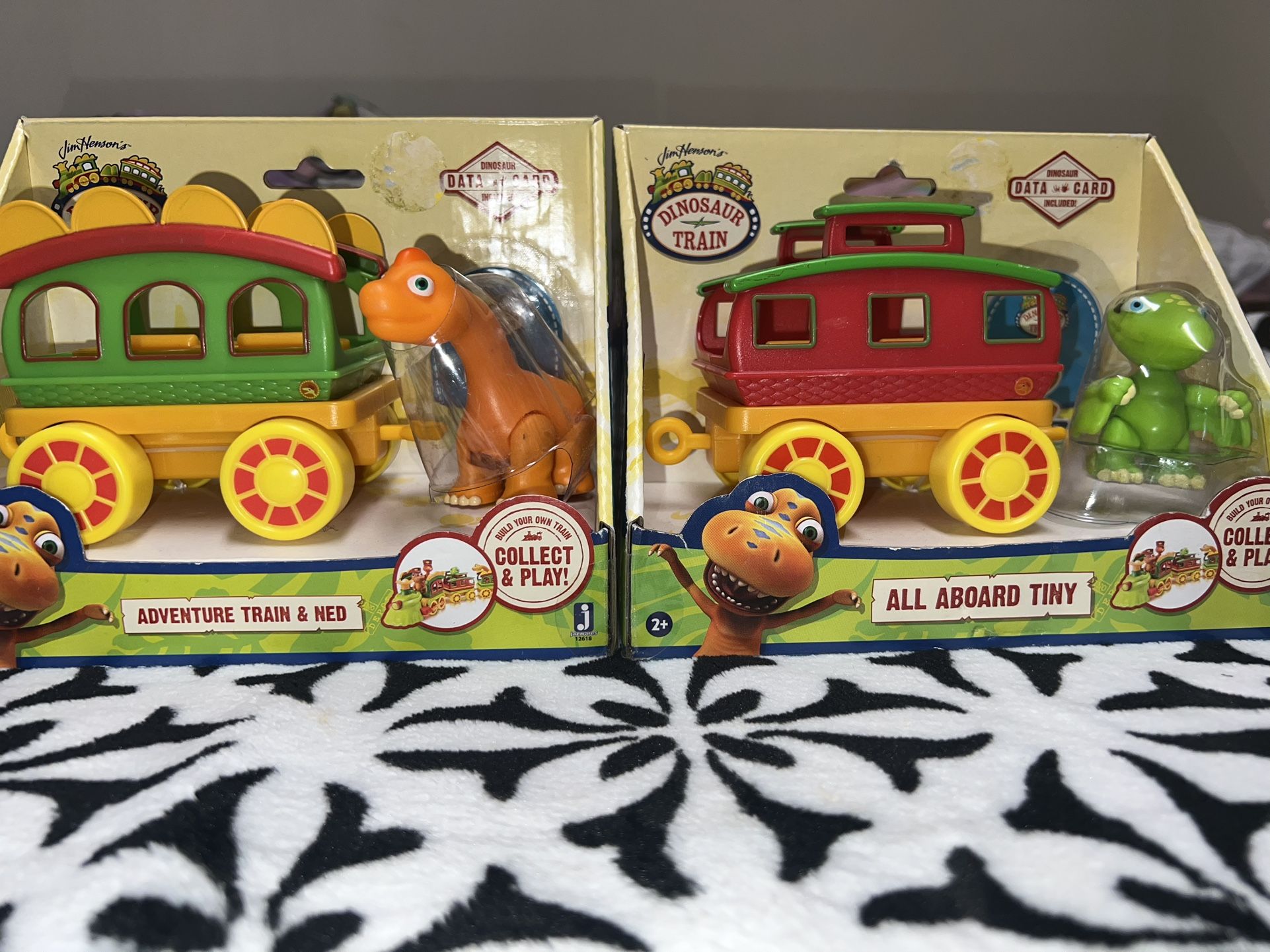 2 Sets Of Dinosaur Train Toys