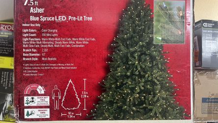 Home Accents Holiday 7.5 ft Asher Blue Spruce Pre-Lit LED Artificial Christmas Tree with 700 8-Function Color Changing Mini Lights