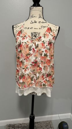 2 Sleeveless Blouses