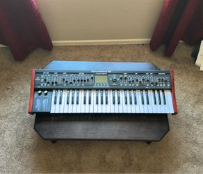 Behringer Deepmind 12 polyphonic synthesizer keyboard piano