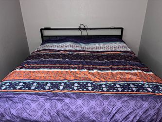 King bed and frame with les headboard