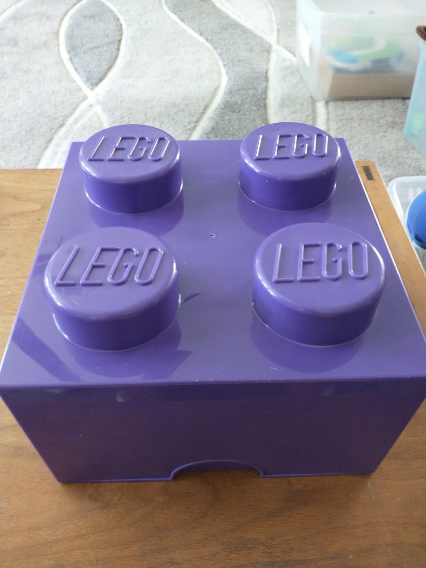 Purple Lego storage brick full of assorted legos