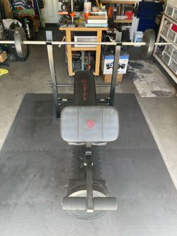 Weight bench , Marcy Club, good condition , comes with weights.