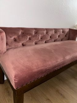Pink velvet sofa
