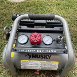 Husky 2 Gal. 135 PSI Portable Electric Oil-Free Quiet Jobsite Air Compressor with Dual Pressure Gauges and 1-Quick Coupler