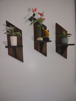 Set of three wall shelves
