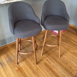Two Blue Bar Height Swivel Stools