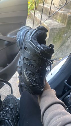 The balenciaga track sneaker in black is an iconic multi-layered technical sneak designed with mesh nylon and a Chunky augmended back rubber sole