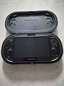 PS Vita w/ 9 games and case