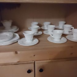 Vintage Indiana Glass Colony Harvest Grape Footed Single Mug, produced in the 1960s. It is made of milk glass 