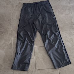 Grey and navy Adidas track pants