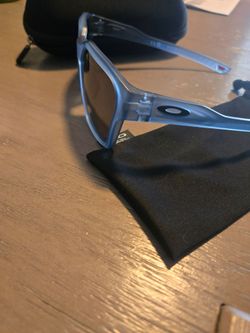 Blue Oakley glasses