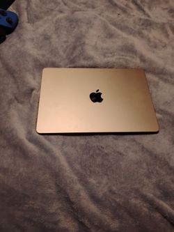 Apple MacBook Air and a Microsoft Xbox one x 1tb