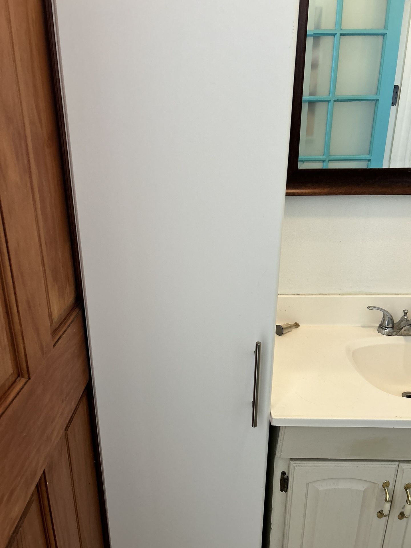 Tall Broom Cabinet