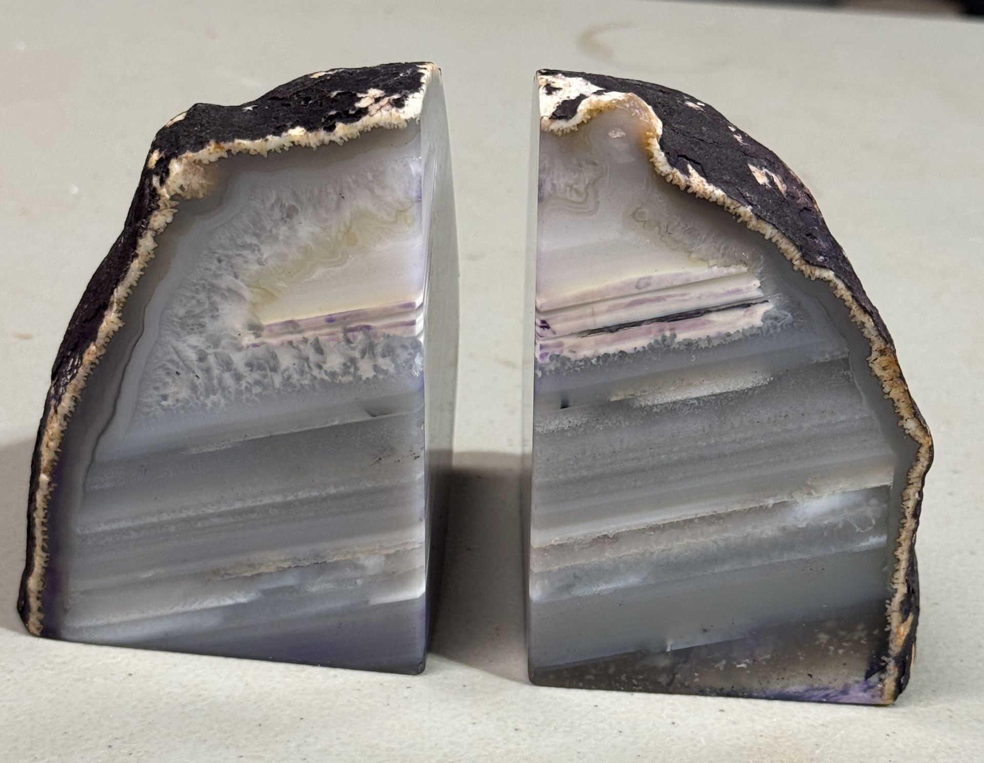 Gorgeous pair of agate bookends. Gray, white , & purple. Approximately 3lb.