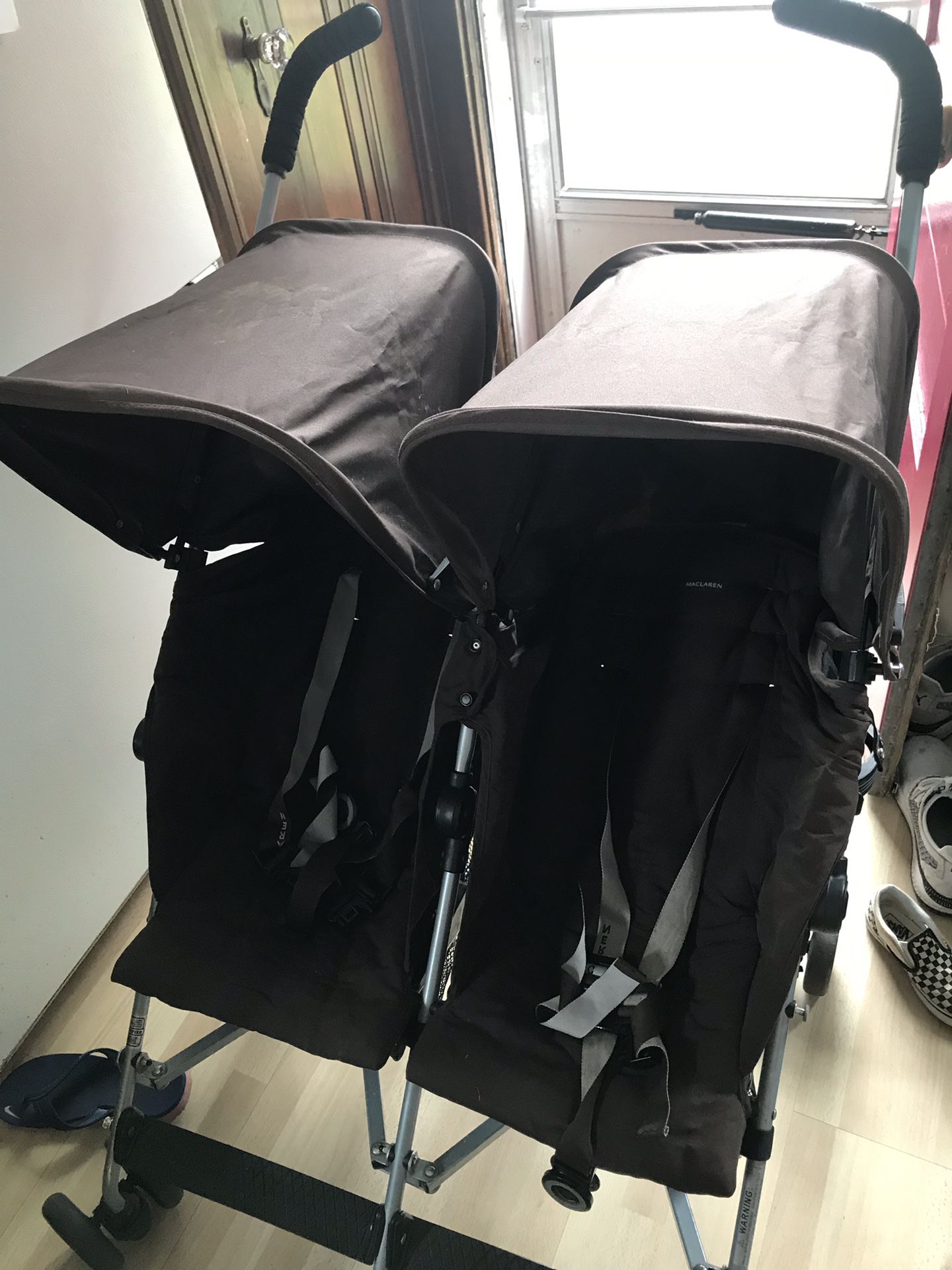 MacLaren double stroller with rain cove n new mosquito net