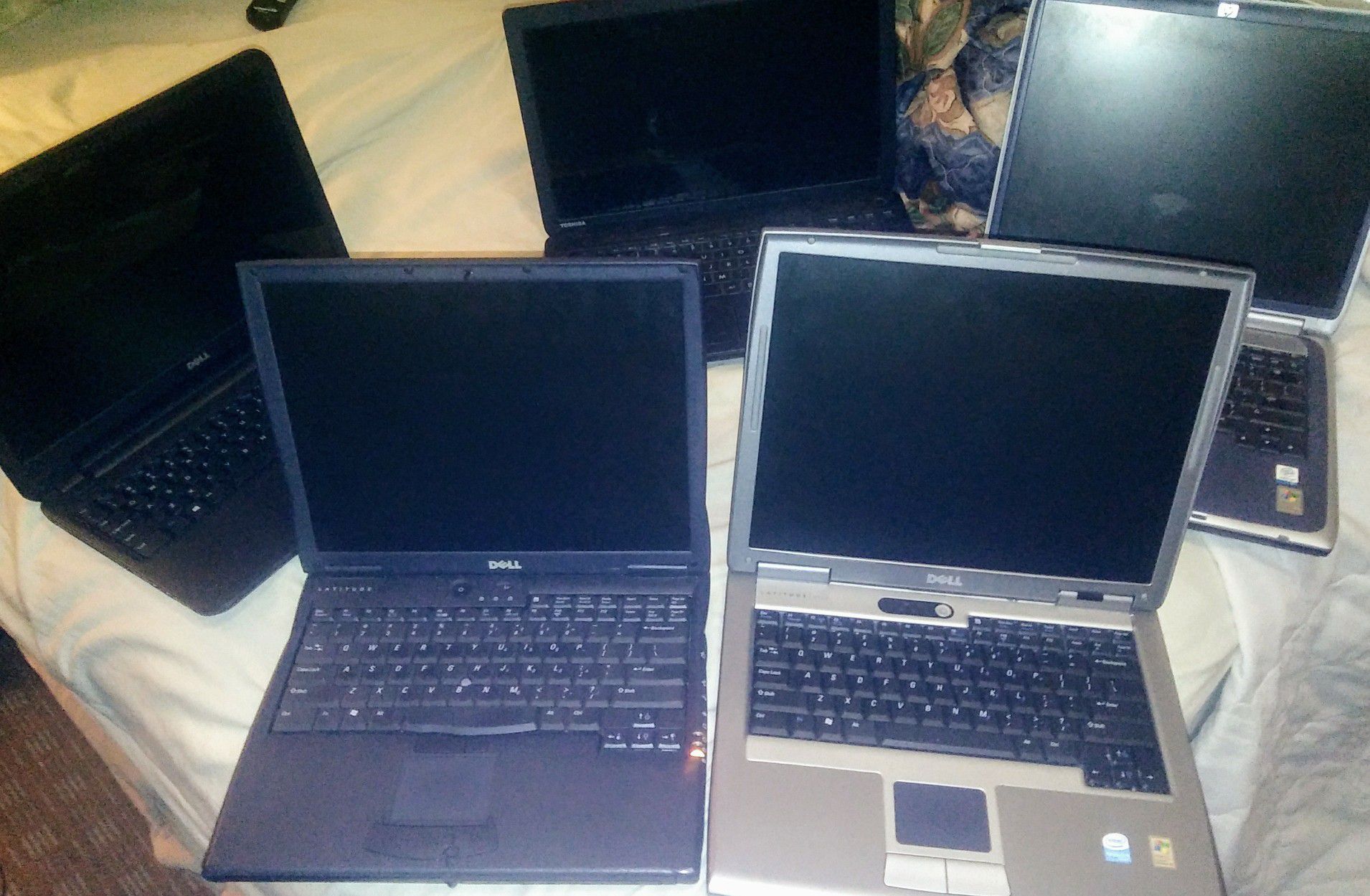 Dell Latitude PP01L, Toshiba Satellite C55-A, Dell Inspiron 15, HP Pavilion ze4900, and and older Dell Inspiron all for one low price!