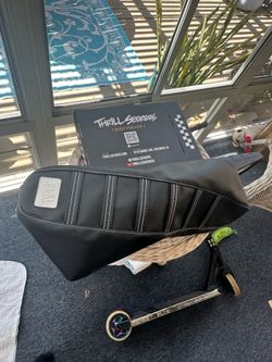 Limited edition thrill seekers seat cover for zooz e-bike.