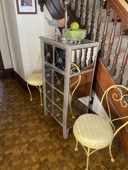 Mirrored Stand And Two Yellow Iron And Fabric Chairs 