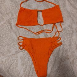 New Medium Orange Bathing Suit.  See Photos. Cash Pickup Only 
