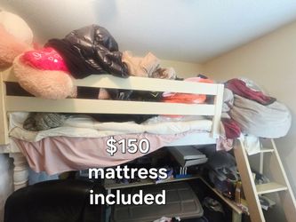 Loft bed with dresser; mattress included.    Arlington 76014