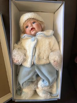 Porcelain Baby Doll in Winter Outfit
