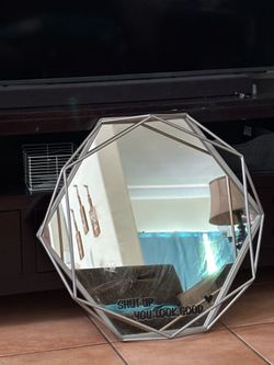 Metal framed mirror