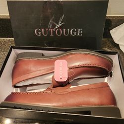 Brand new pair of brown leather penny loafers